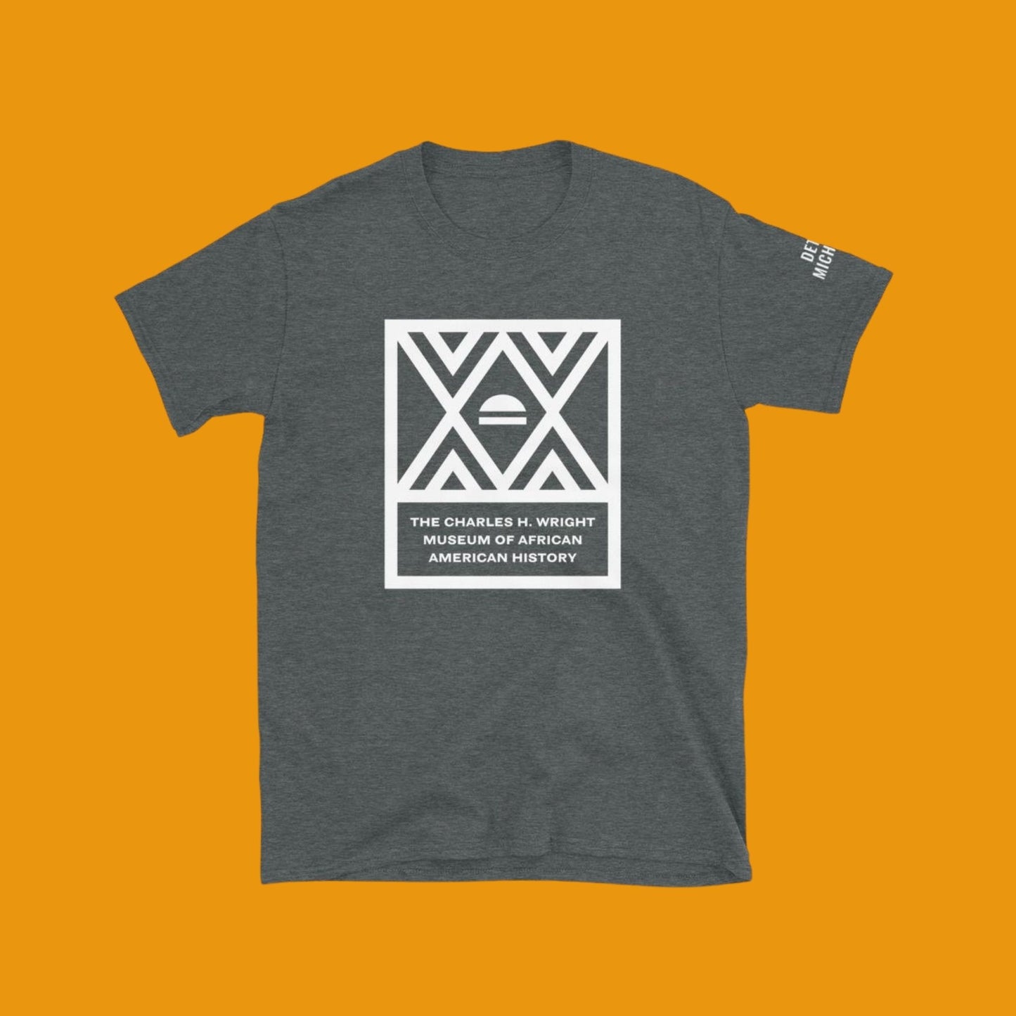 The logo of the Charles H. Wright Museum emblazoned , in white, on the front of a dark, heather gray, cotton t-shirt.
