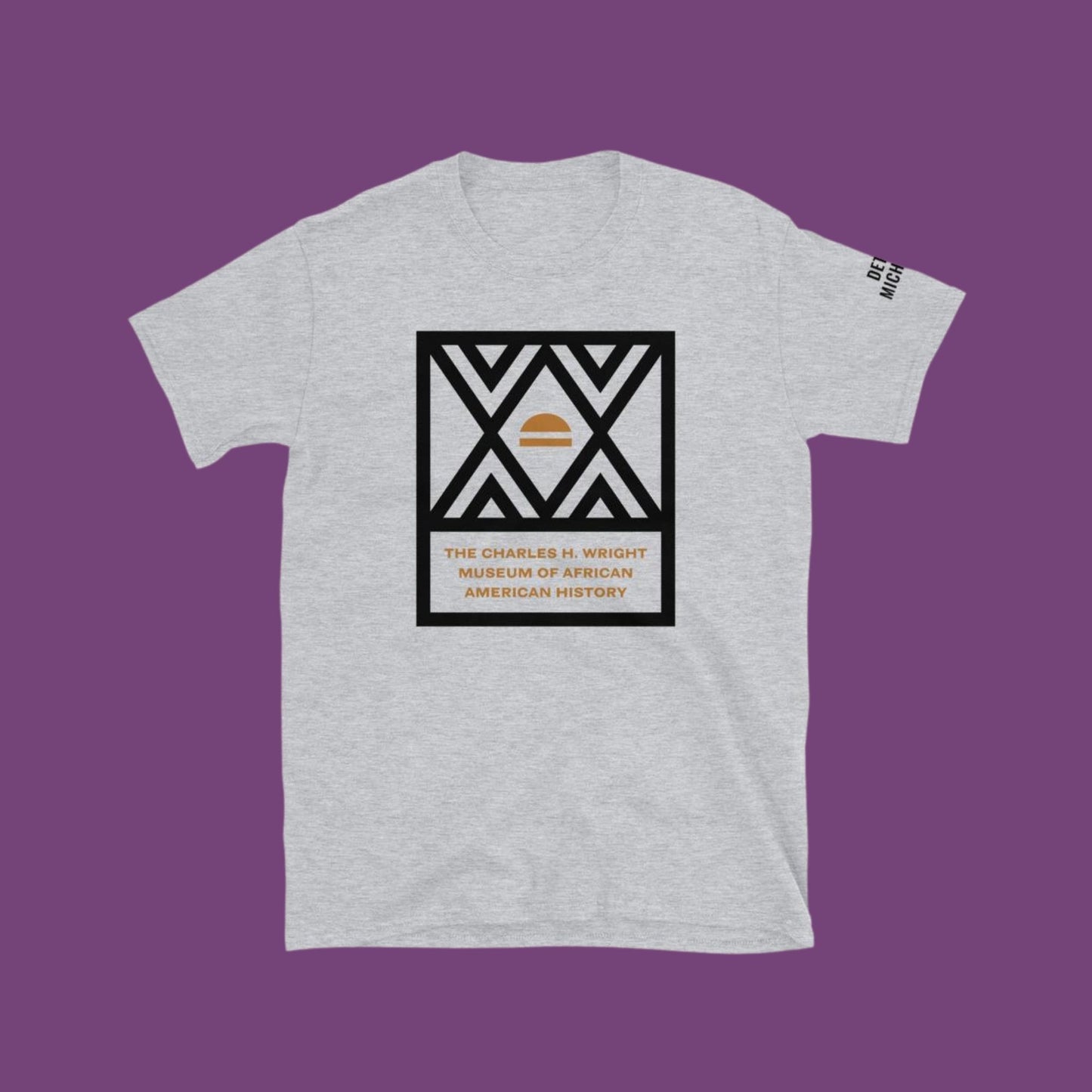 The logo of the Charles H. Wright Museum emblazoned , in black, on the front of a light gray, cotton t-shirt.