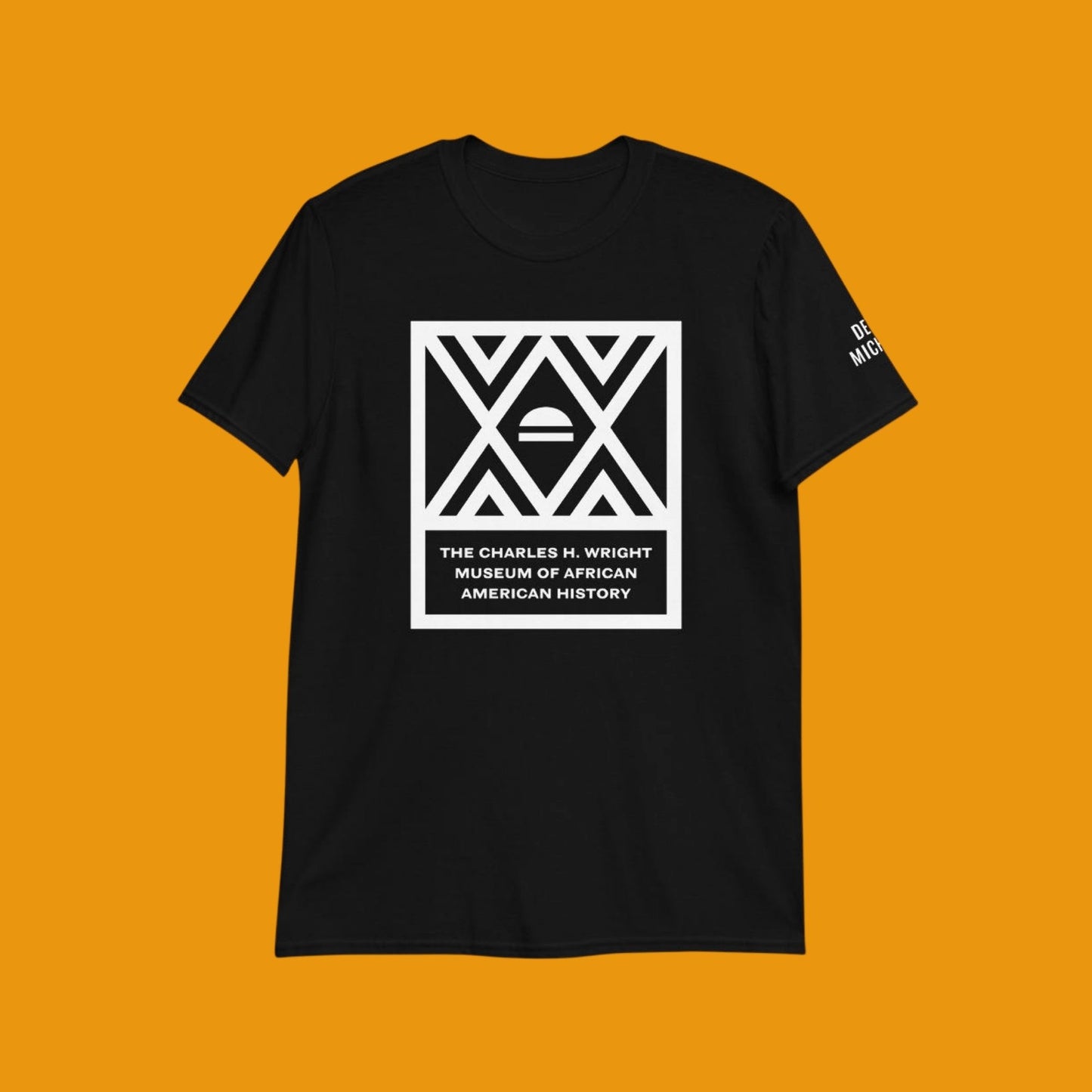 The logo of the Charles H. Wright Museum emblazoned , in white, on the front of a black, cotton t-shirt.