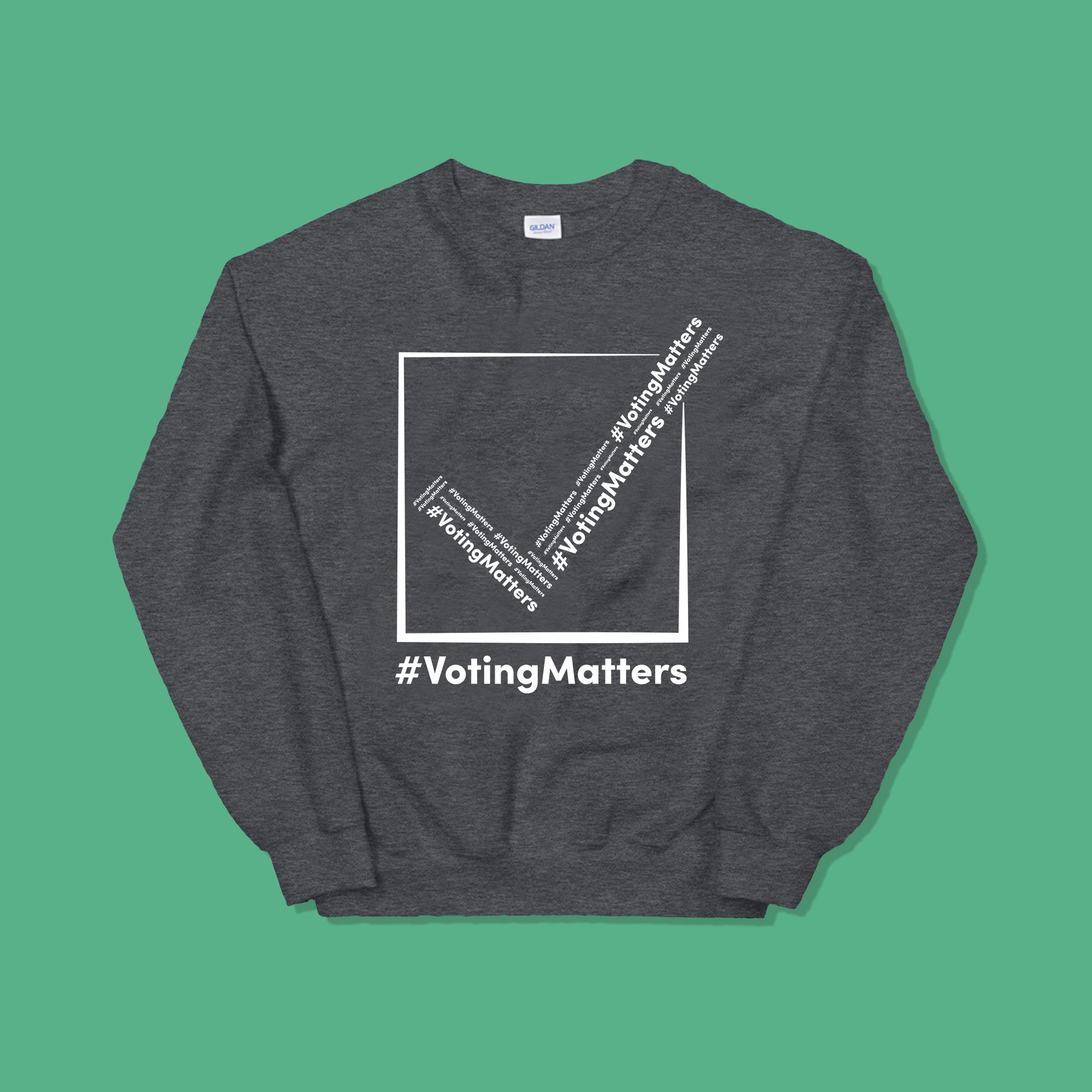 dark grey sweatshirt with hashtag voting matters logo on it with white lettering