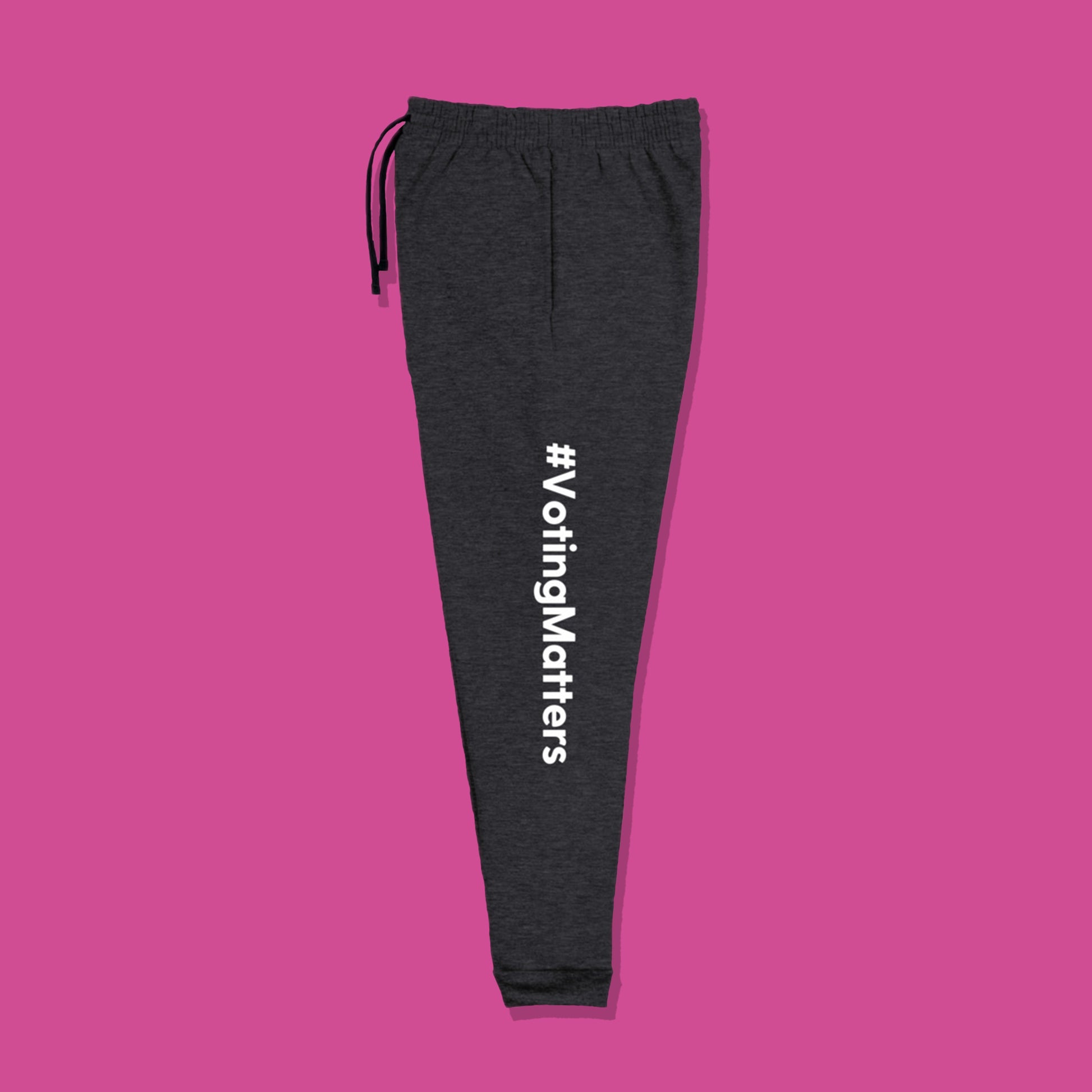 dark heather grey cotton sweatpants with hashtag voting matters printed lengthwise in white on the left leg of pants